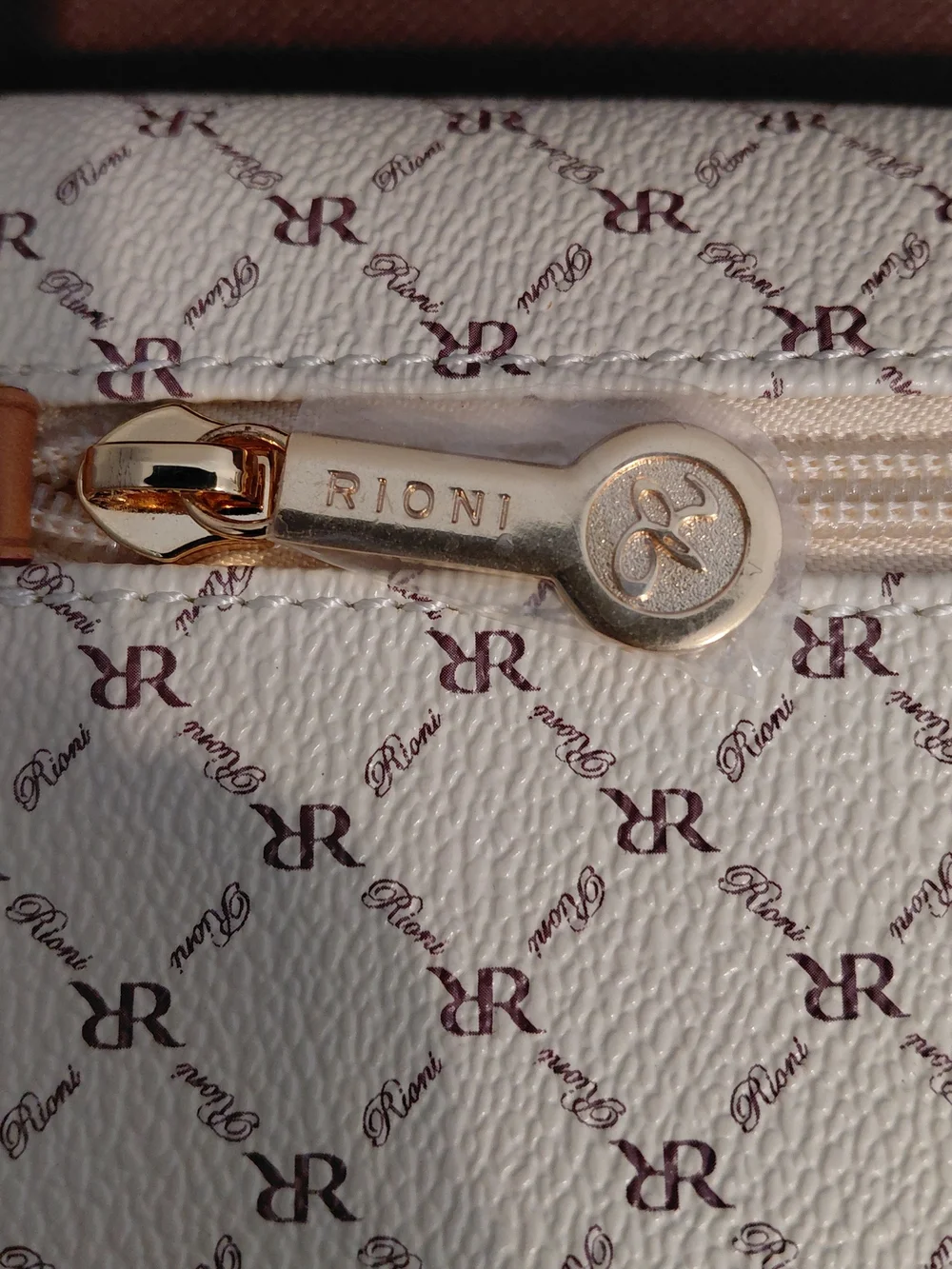 Rioni Cream Monogram Clutch with Gold Emblem